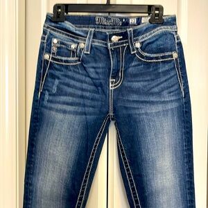 Miss Me Mid rise skinny jeans. Size 27 with a 30 inseam